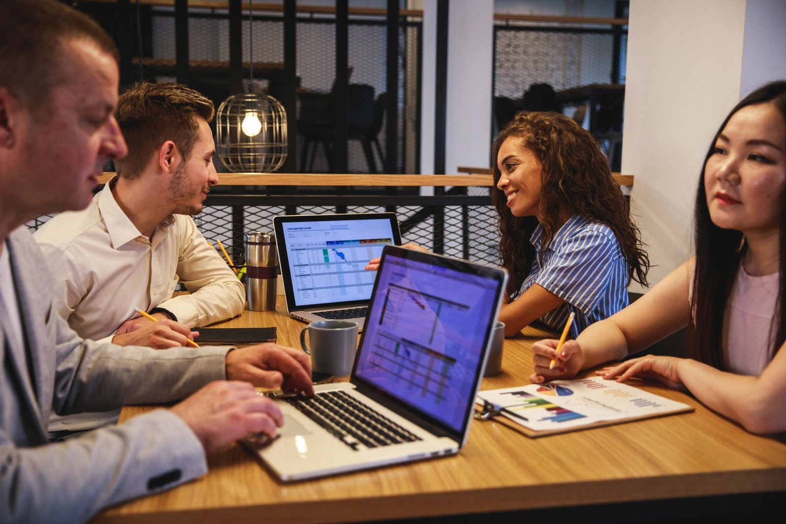 Business team discussing digital growth strategy in a boardroom