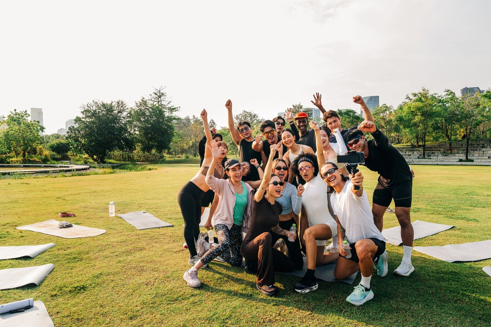 Group fitness session with active members outdoors